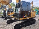 2023 Caterpillar 313D2 GC crawler excavator, front three-quarter view