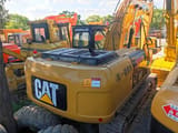 2023 Caterpillar 325C crawler excavator, rear three-quarter view