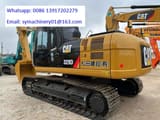 2023 Caterpillar 329D crawler excavator, rear three-quarter view