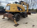 2010 Caterpillar M313D wheel excavator rear view