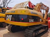 2024 Caterpillar 320CL crawler excavator, rear three-quarter view