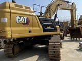 2021 Caterpillar 349 crawler excavator, rear three-quarter view