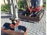 2009 Takeuchi TB108 mini excavator, front three-quarter view
