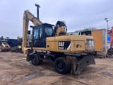 2012 Caterpillar M322D MH material handler, rear three-quarter view