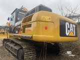 2021 Caterpillar 336D crawler excavator rear three-quarter view