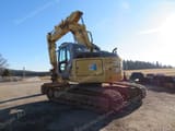 2009 New Holland E235BSR-2 ES crawler excavator, rear three-quarter view