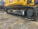 2019 Komatsu PC130 crawler excavator undercarriage view