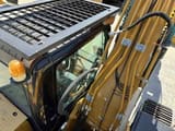 2021 Caterpillar 320E crawler excavator cab and boom detail