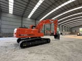 2020 Doosan DX225LC-9C crawler excavator, rear three-quarter view