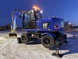 2014 Caterpillar M313D wheel excavator, rear three-quarter view
