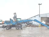 2014 Fuchs MHL 820 D E material handler, side view