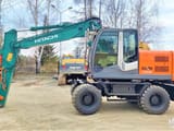 2012 Hitachi Zaxis 140W wheel excavator, side view
