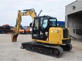 2018 Caterpillar 308E2CR mini excavator, rear three-quarter view