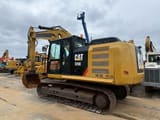 2016 Caterpillar 320E crawler excavator, rear three-quarter view