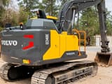 Volvo EC140E crawler excavator, rear three-quarter view