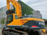 Hyundai R305LC-9T crawler excavator, rear three-quarter view