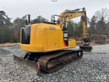 2017 Caterpillar 313FL crawler excavator, rear three-quarter view