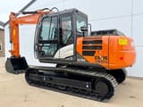 2025 Hitachi Zaxis 140H crawler excavator, rear three-quarter view