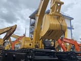 2017 Caterpillar 320C amphibious excavator, front three-quarter view