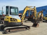 2006 New Holland E50.2C mini excavator, rear three-quarter view