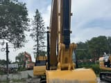 2020 Caterpillar 320GC crawler excavator, front view of bucket and boom