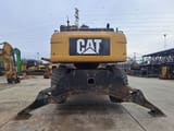 2009 Caterpillar M325D LMH material handler rear view