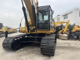 2021 Caterpillar 345D crawler excavator, rear-quarter view