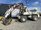 2005 Mecalac 12MXT wheel excavator, side view