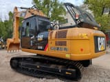 2024 Caterpillar 324DL crawler excavator, rear three-quarter view