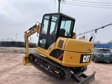 2021 Caterpillar 306D crawler excavator, rear three-quarter view