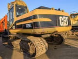 2010 Caterpillar 325BL crawler excavator rear three-quarter view