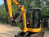 2020 Caterpillar 303CR mini excavator, front three-quarter view