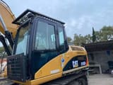 2020 Caterpillar 315DL crawler excavator cab and boom view