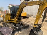 Caterpillar 306D mini excavator, side view
