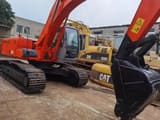 Hitachi EX200 crawler excavator, side view