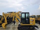 2023 Caterpillar 306E2 mini excavator, side view