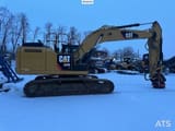2012 Caterpillar 324E crawler excavator, side view