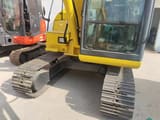 2022 Komatsu PC60-8 mini excavator, front three-quarter view