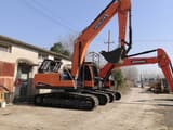 2024 Doosan DX225LCA Гусеничный экскаватор