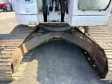 2007 New Holland E235SR-1ES crawler excavator undercarriage view