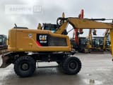 2015 Caterpillar M318F wheel excavator side view