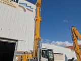 2017 Liebherr LH40 M material handler, front three-quarter view