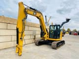 2019 Caterpillar 309 CR mini excavator, front three-quarter view