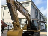 2022 Caterpillar 320GX crawler excavator, front three-quarter view