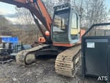 1998 Hitachi EX165 crawler excavator, front three-quarter view