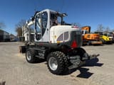 2020 Wacker Neuson EW100 wheel excavator, rear three-quarter view