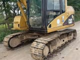 2022 Caterpillar 311C crawler excavator, side view