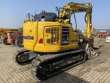 2023 Komatsu PC138US-11 crawler excavator, rear three-quarter view
