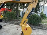 2024 Caterpillar 306E2 mini excavator boom and bucket detail