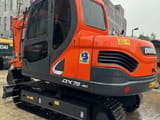 Doosan DX75-9C crawler excavator, rear three-quarter view